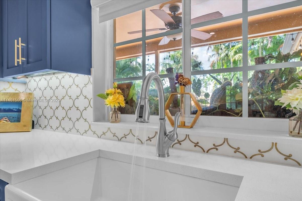 4103 Polk Street Hollywood, FL 33021 - Photo 9 of 55 a room with a table and chairs