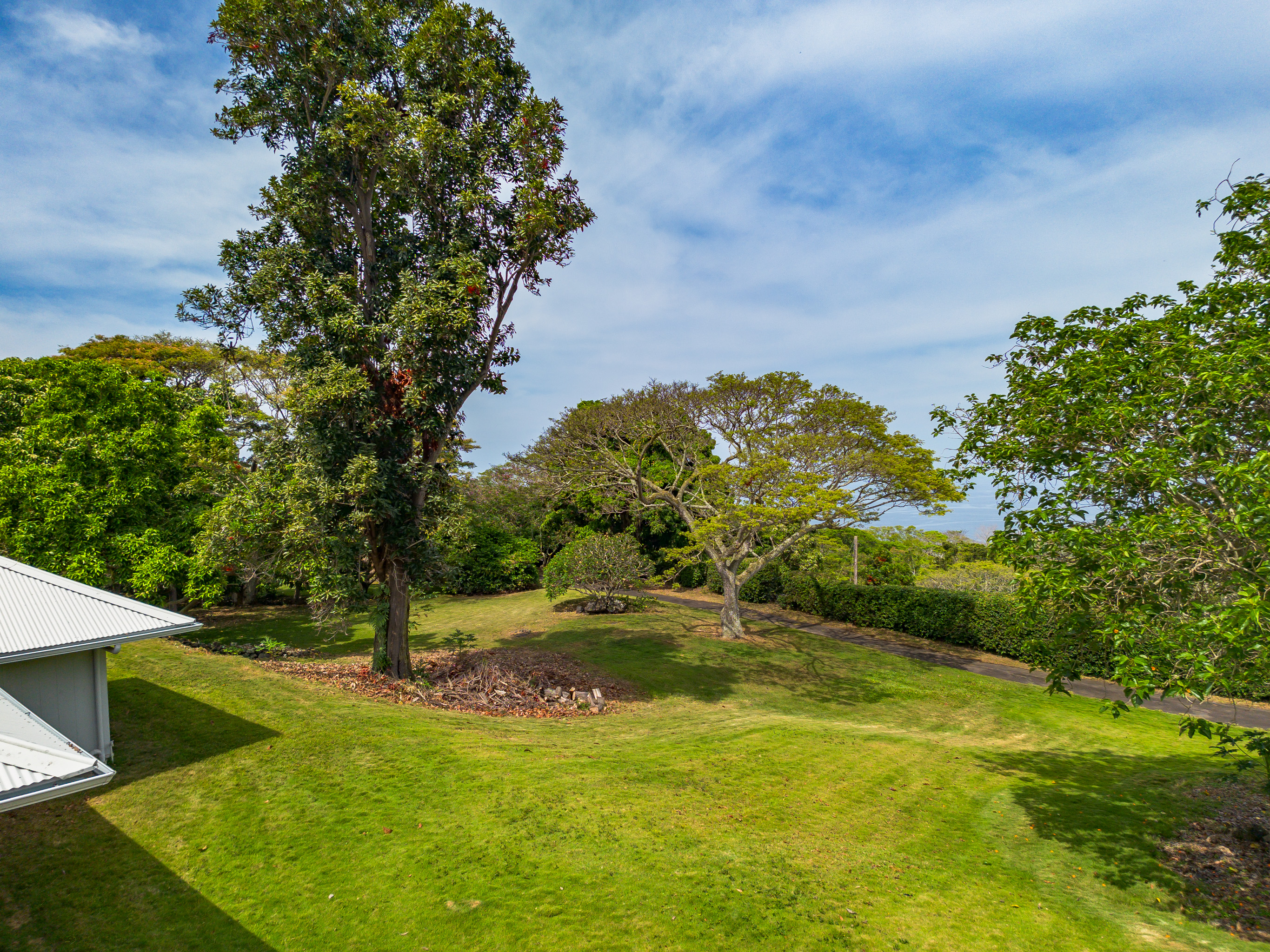86-4190 Hookena Beach Road Captain Cook, HI 96704 - Photo 17 of 30 a view of a yard with swimming pool