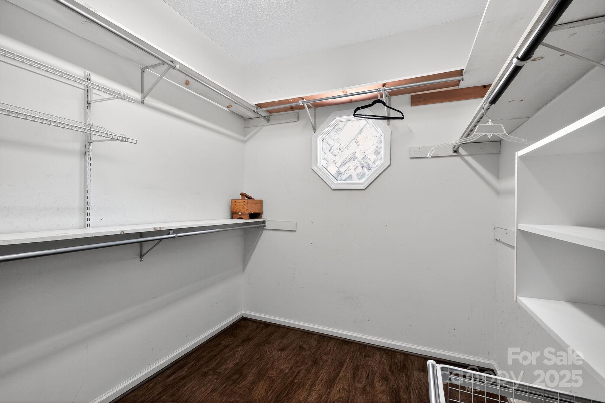 208 Stone Ridge Drive Salisbury, NC 28146 - Photo 20 of 35 a view of a store room with racks on the wall