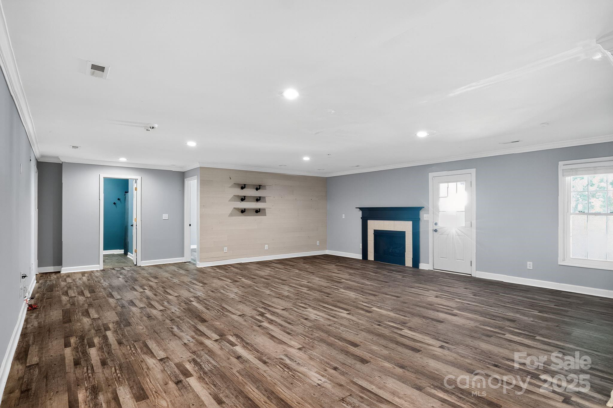 208 Stone Ridge Drive Salisbury, NC 28146 - Photo 28 of 35 a view of a livingroom with a fireplace and window