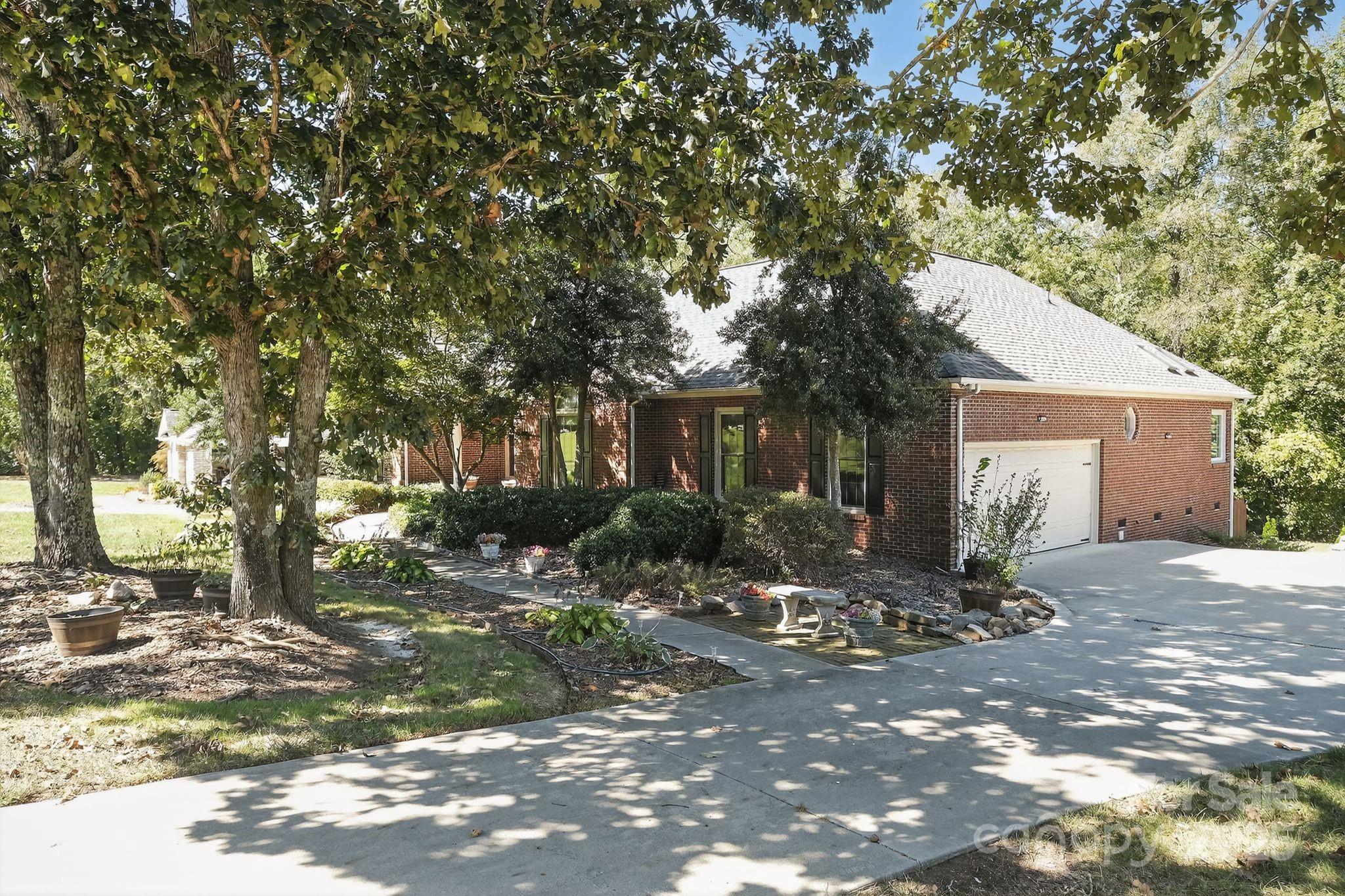 208 Stone Ridge Drive Salisbury, NC 28146 - Photo 3 of 35 a view of a house with a yard