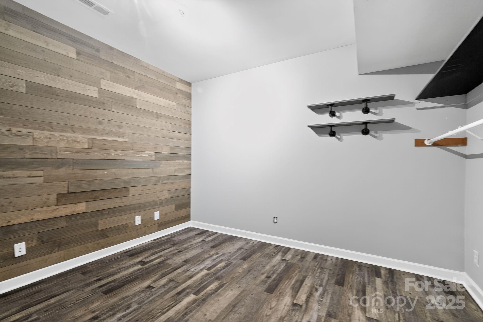 208 Stone Ridge Drive Salisbury, NC 28146 - Photo 31 of 35 a room with a bench