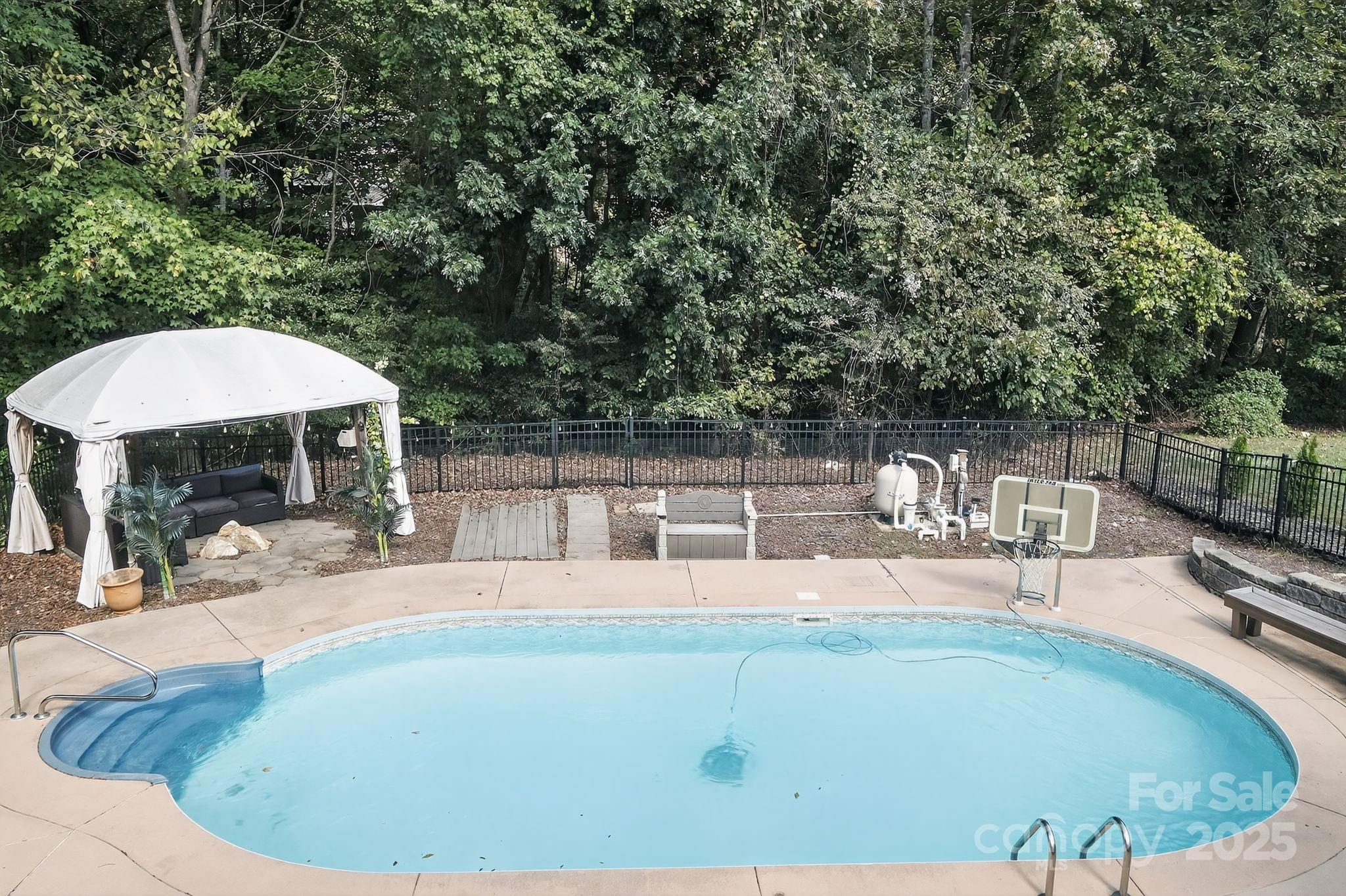 208 Stone Ridge Drive Salisbury, NC 28146 - Photo 7 of 35 a view of a swimming pool with a patio