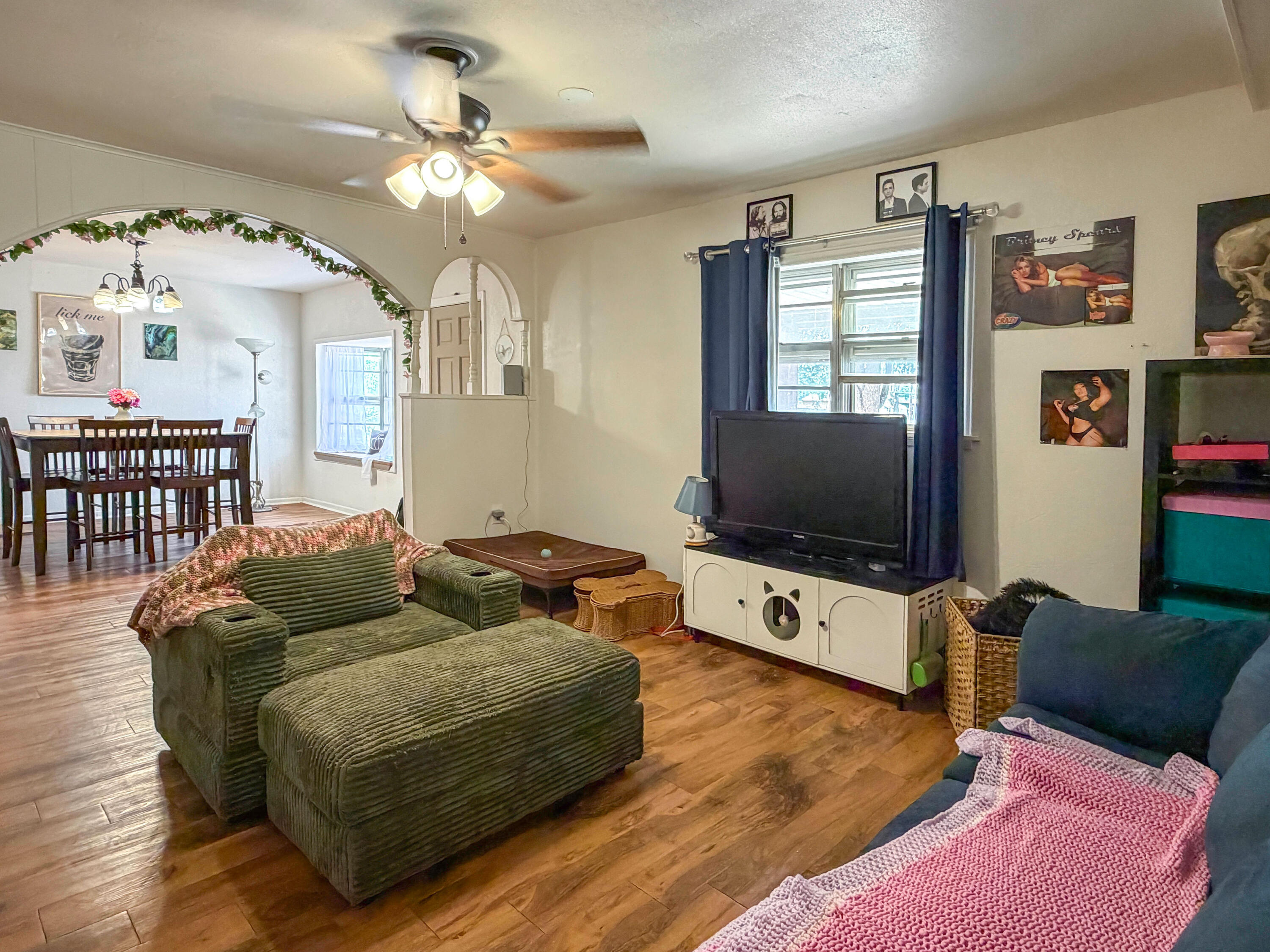 3221 Emory Street Lubbock, TX 79415 - Photo 5 of 15 a living room with furniture and a flat screen tv