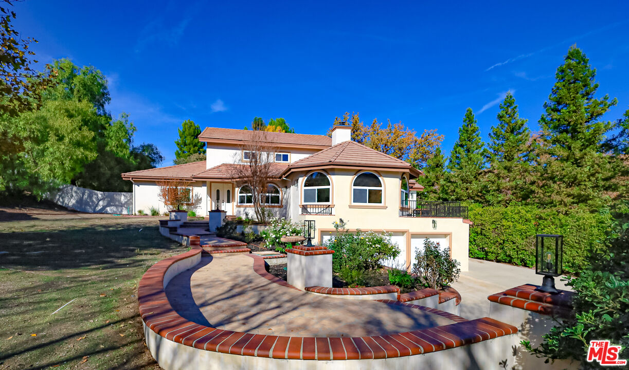 28925 Wagon Road Agoura Hills, CA 91301 - Photo 1 of 1 a view of a house with backyard porch and sitting area
