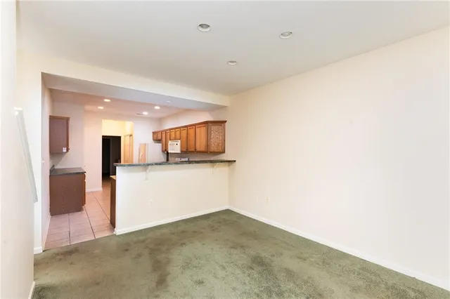 a view of a kitchen with a sink