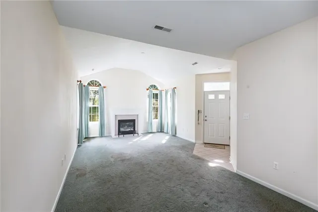 a view of a livingroom with a fireplace