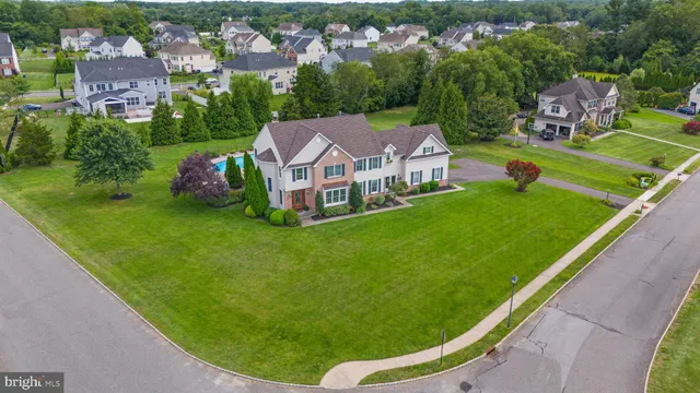 a view of a chairs and table in patio