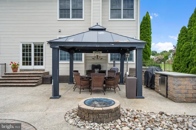 a view of a swimming pool with lounge chair