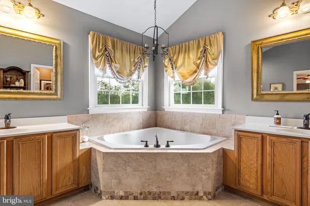 a living room with furniture fireplace and flat screen tv