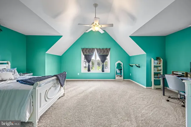 a view of a livingroom with furniture and a wooden floor