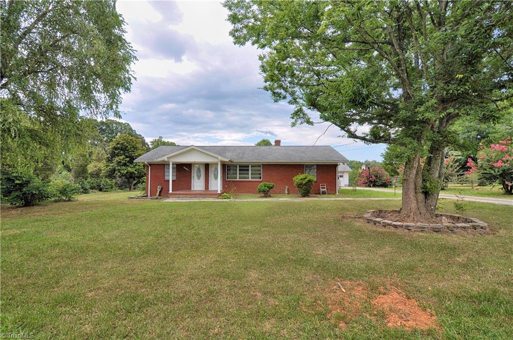 2823 Enterprise Road Lexington, NC 27295 - Photo 1 of 24 Street view showing large shade trees.