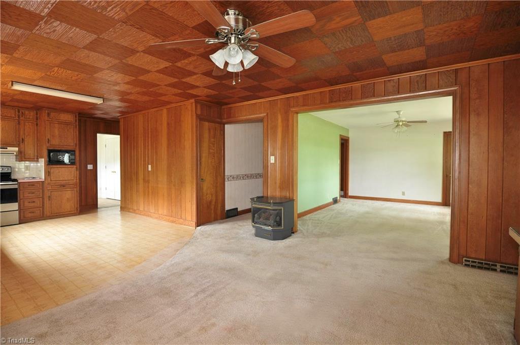 2823 Enterprise Road Lexington, NC 27295 - Photo 6 of 24 Very open concept between kitchen/dining/living room areas. Gas stove to remain.