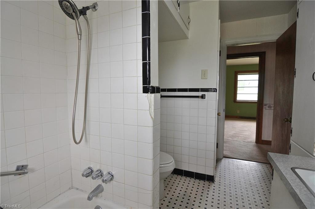 2823 Enterprise Road Lexington, NC 27295 - Photo 10 of 24 Spacious bathroom with retro black and white tile.