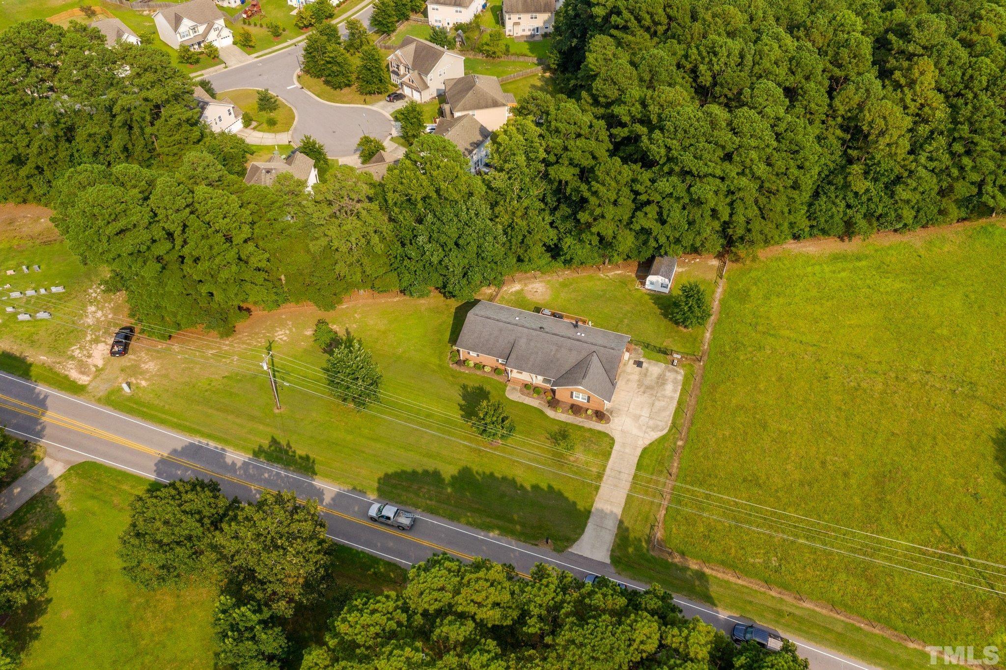 705 Sherron Road Durham, NC 27703 - Photo 11 of 28 a view of a yard with an outdoor space