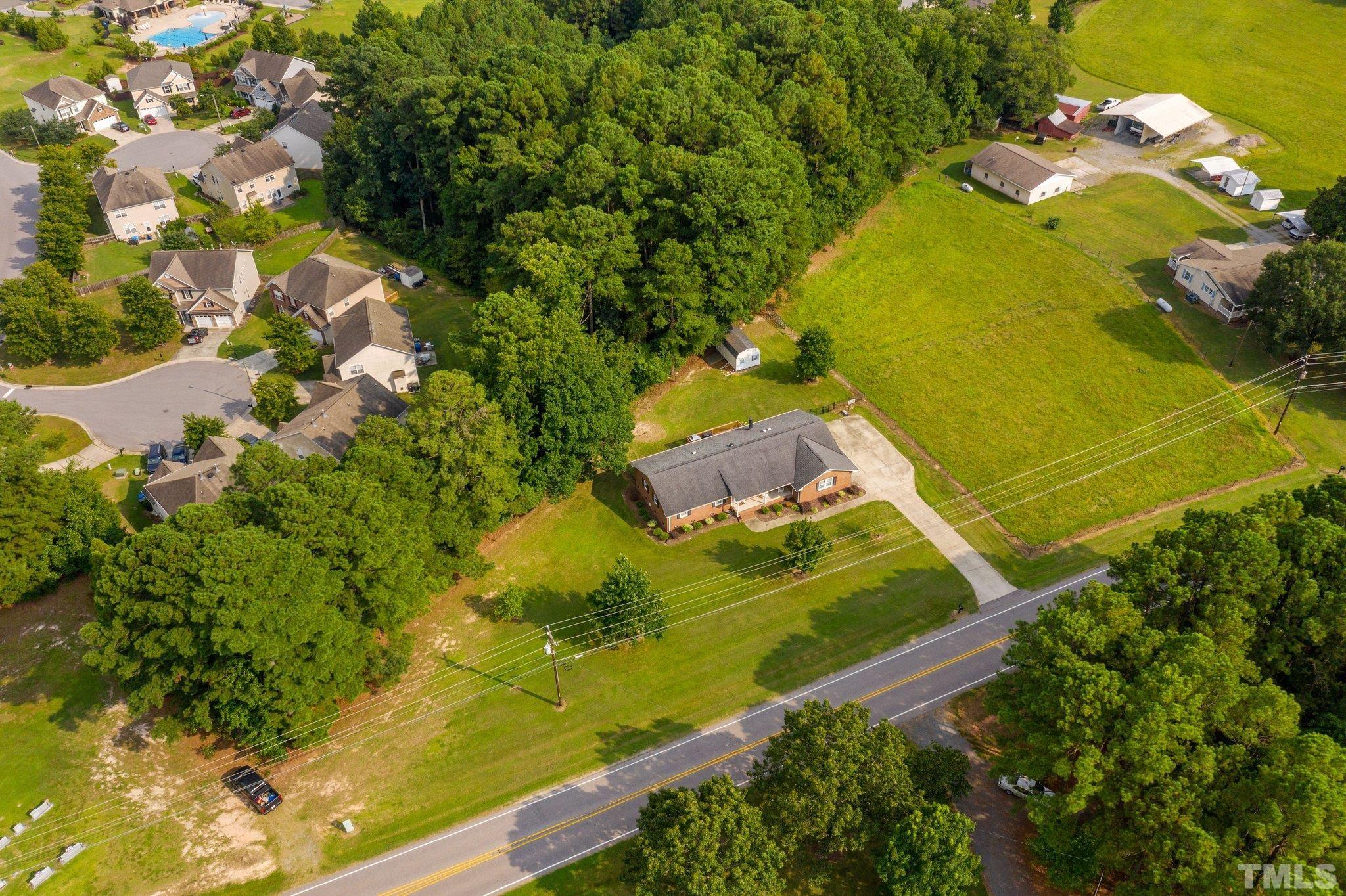 705 Sherron Road Durham, NC 27703 - Photo 12 of 28 an aerial view of a residential houses with yard