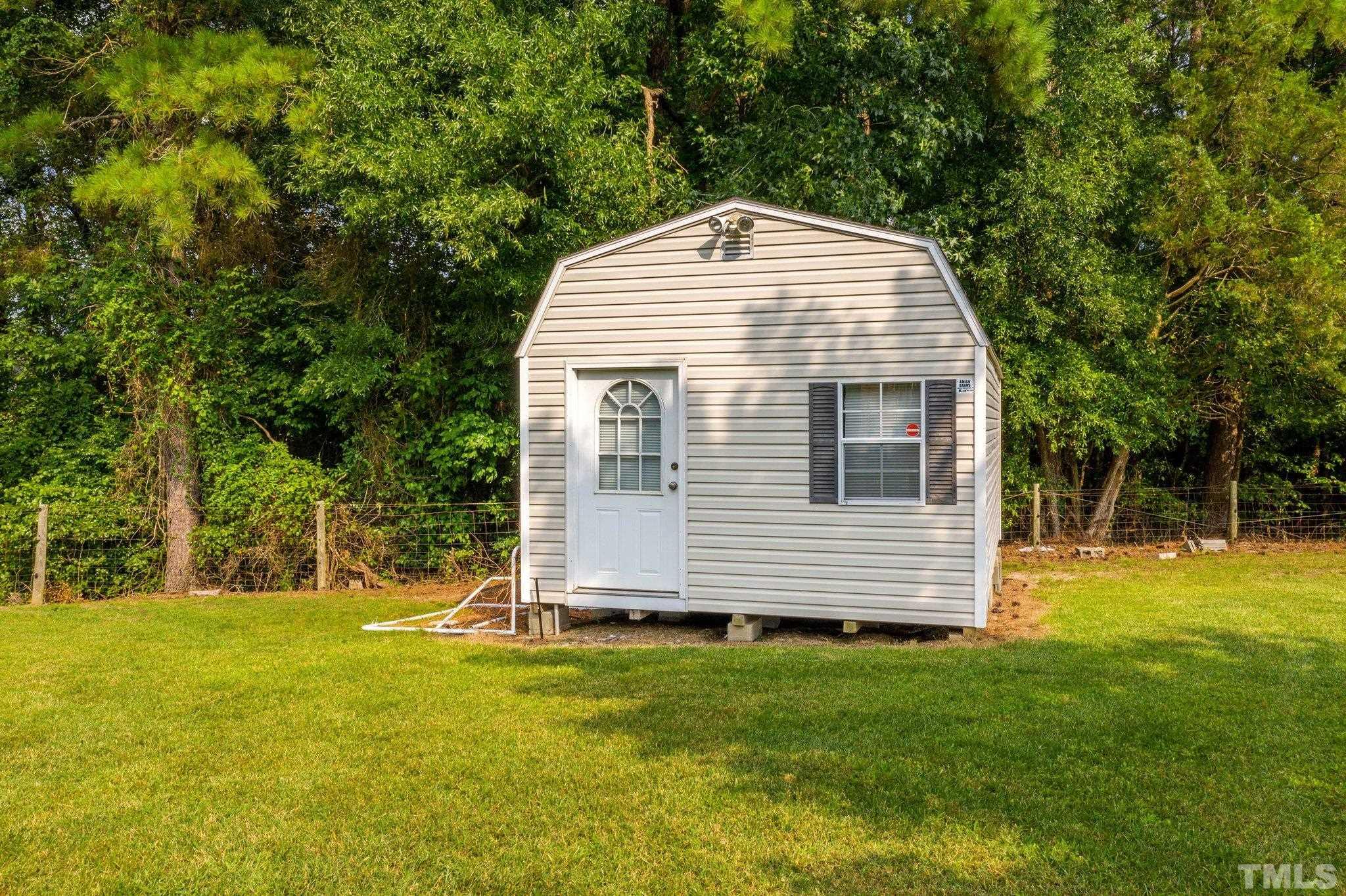 705 Sherron Road Durham, NC 27703 - Photo 6 of 28 a front view of house with yard