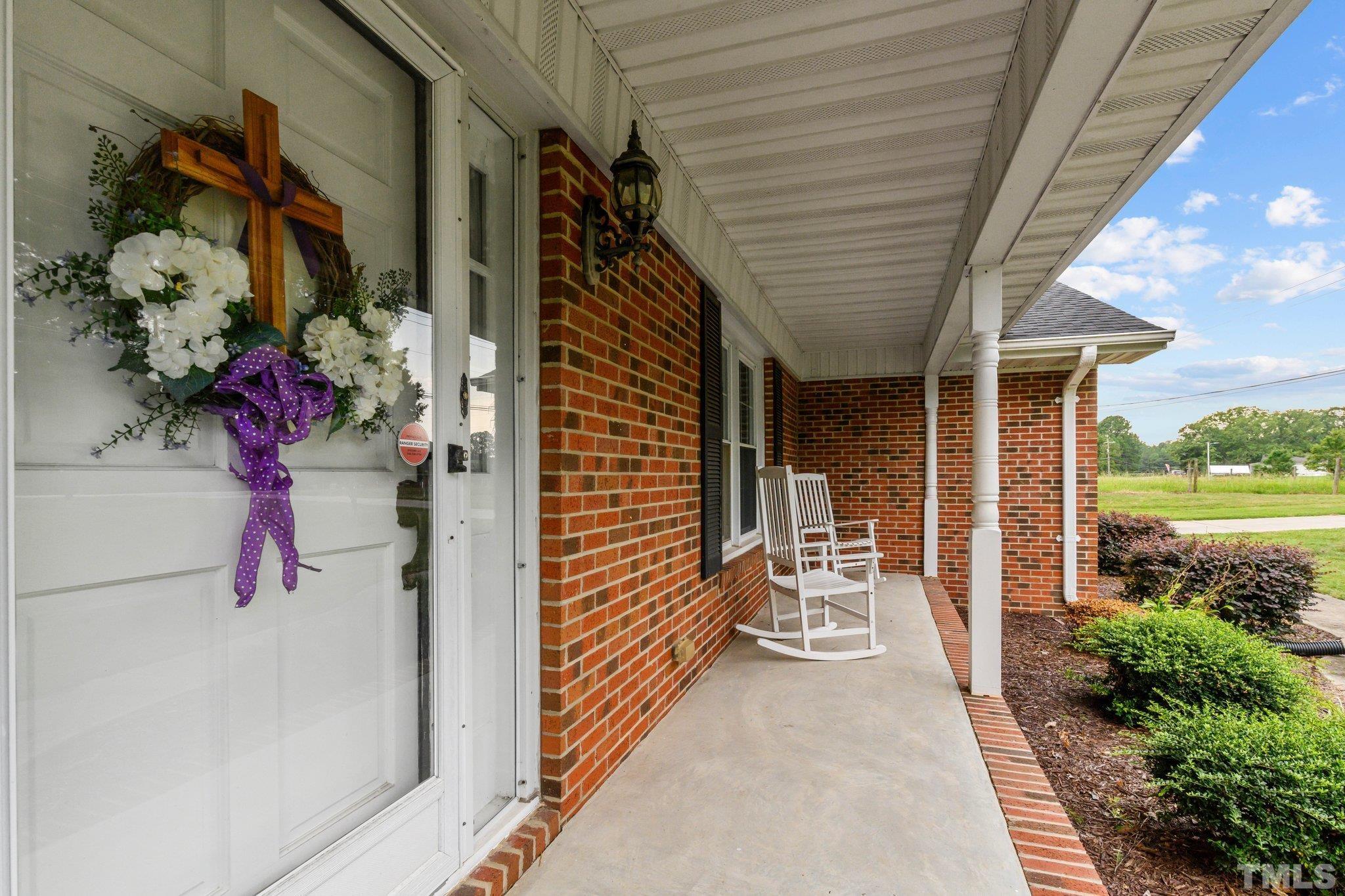 705 Sherron Road Durham, NC 27703 - Photo 7 of 28 a view of a porch with furniture