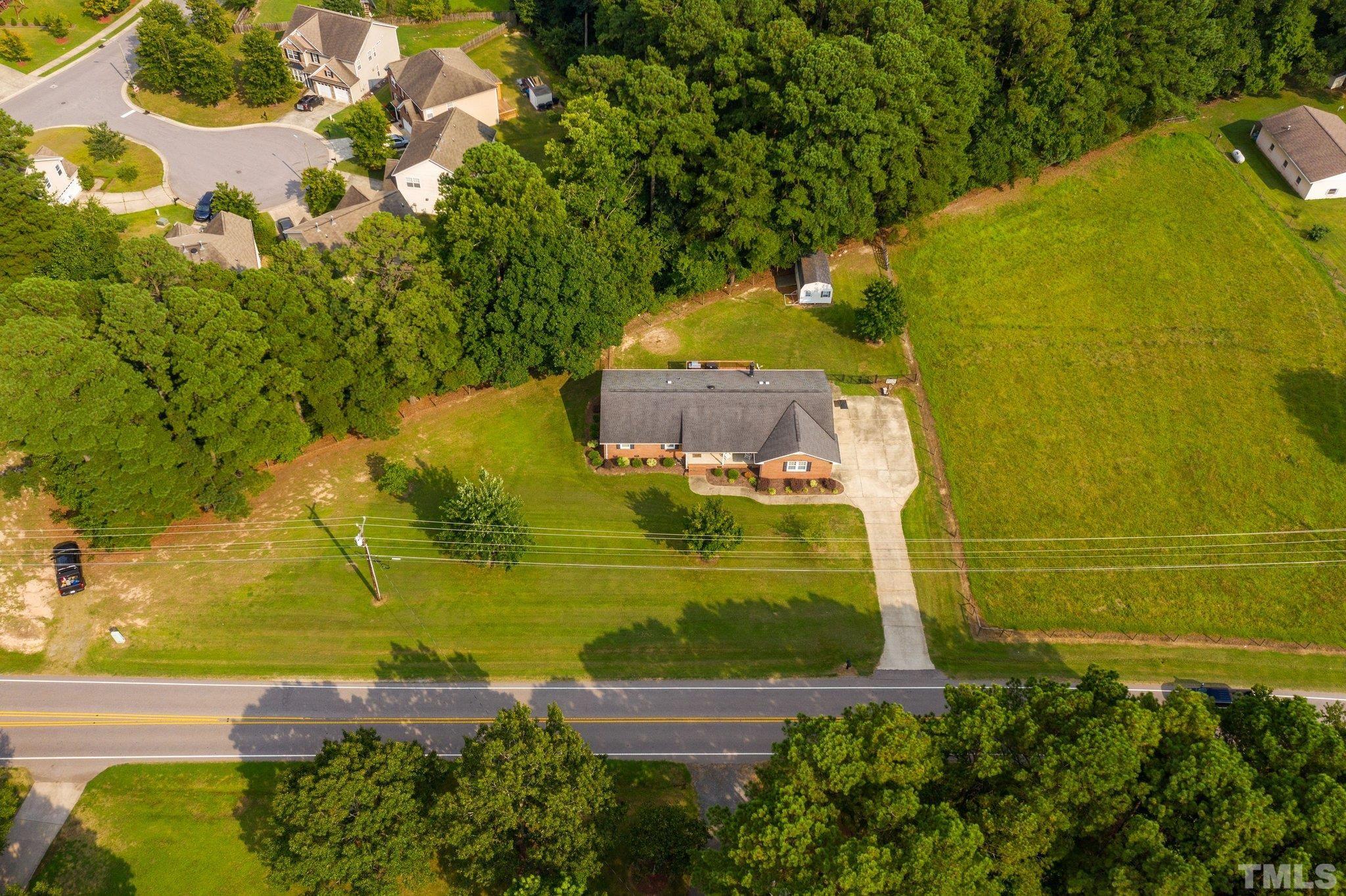 705 Sherron Road Durham, NC 27703 - Photo 10 of 28 a view of a yard with an outdoor space