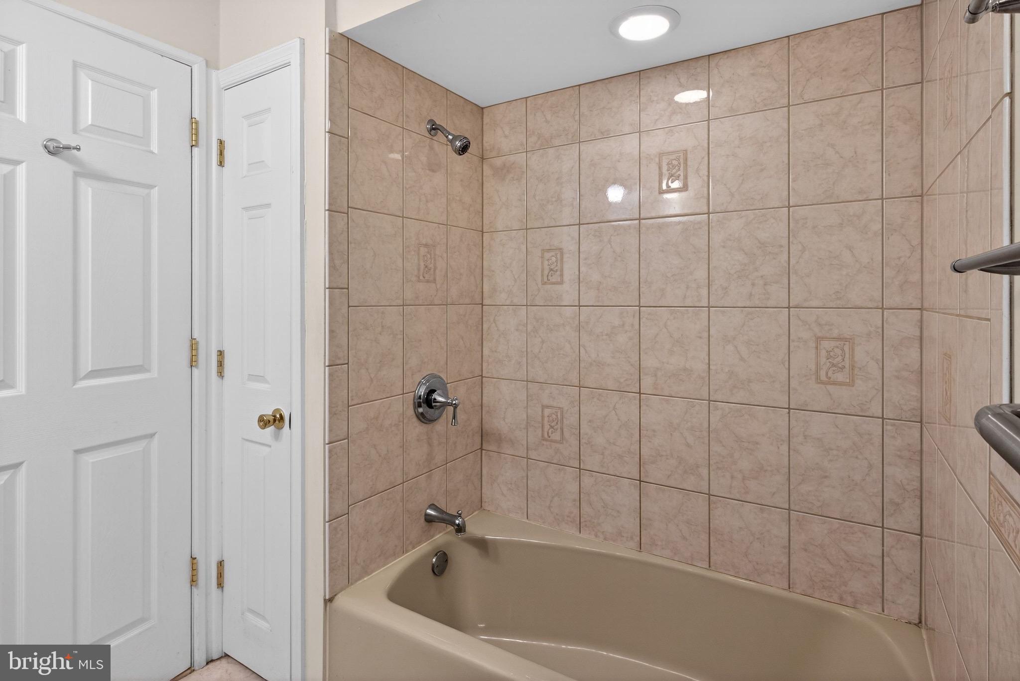 764 Lakehurst Road Browns Mills, NJ 08015 - Photo 13 of 36 a bathroom with a bathtub
