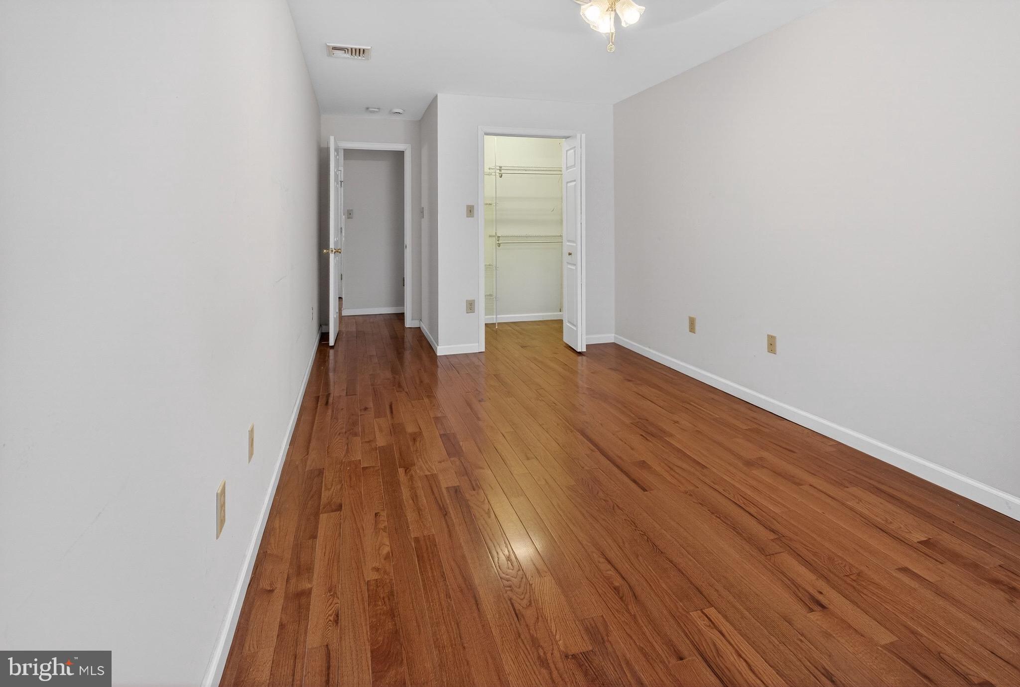 764 Lakehurst Road Browns Mills, NJ 08015 - Photo 23 of 36 wooden floor in a hall with an entryway