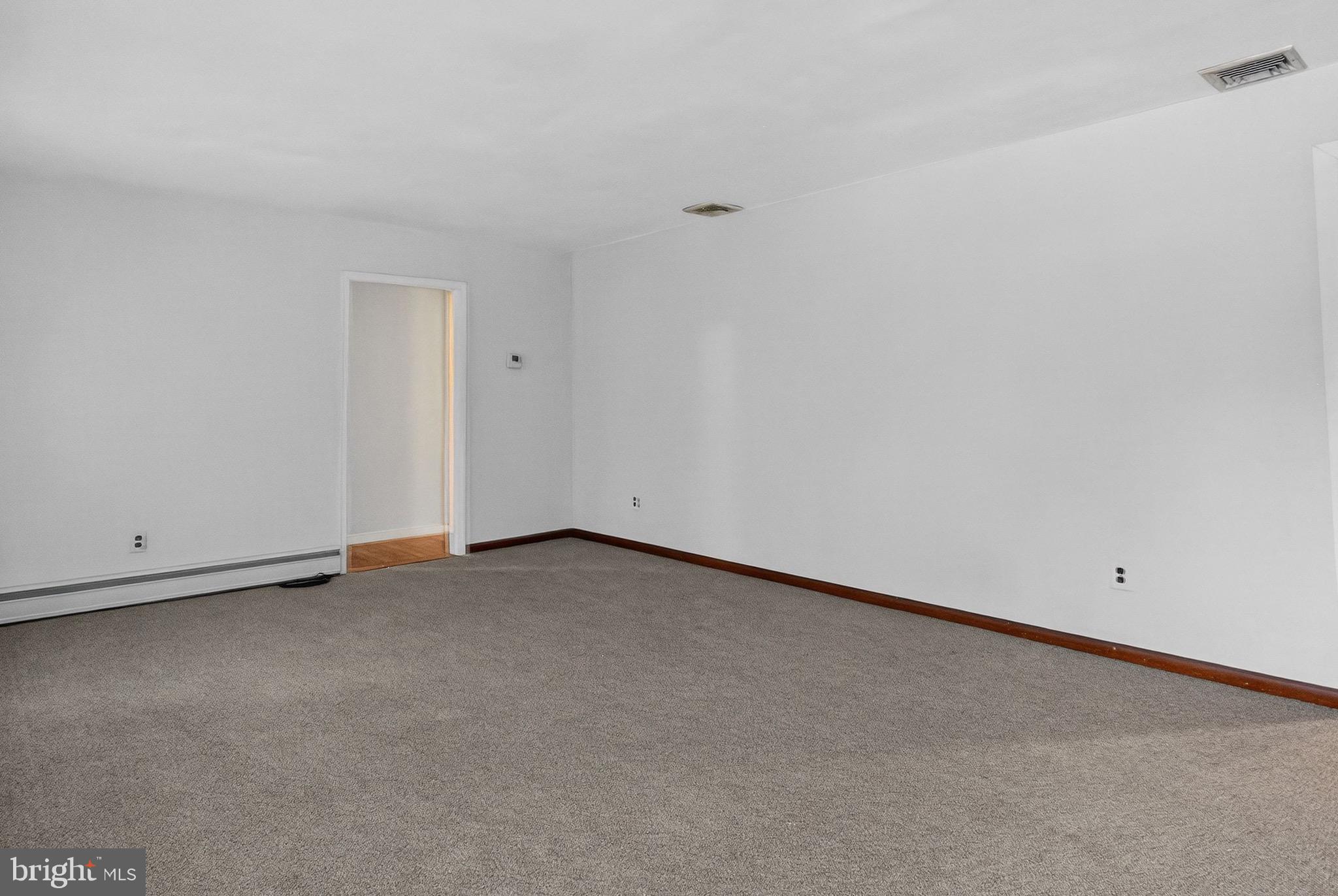 764 Lakehurst Road Browns Mills, NJ 08015 - Photo 5 of 36 a view of an empty room