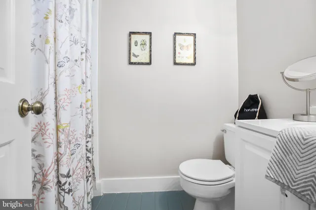 a bedroom with a bed and a cabinets