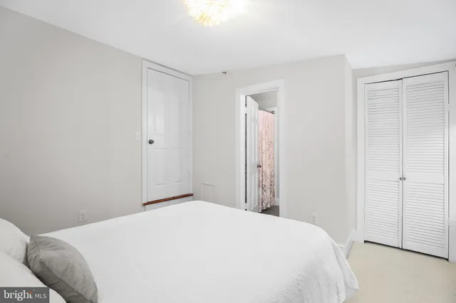 a view of a chair and table in the balcony
