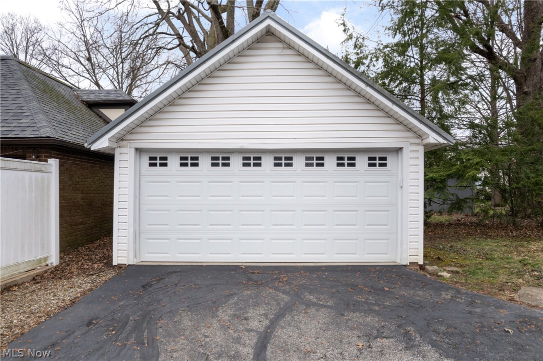 2214 Cleveland Road Wooster, OH 44691 - Photo 32 of 38 The Garage - Do notice the windows in the top row of panels which makes it much easier to see inside the garage with the door closed on an overcast day.