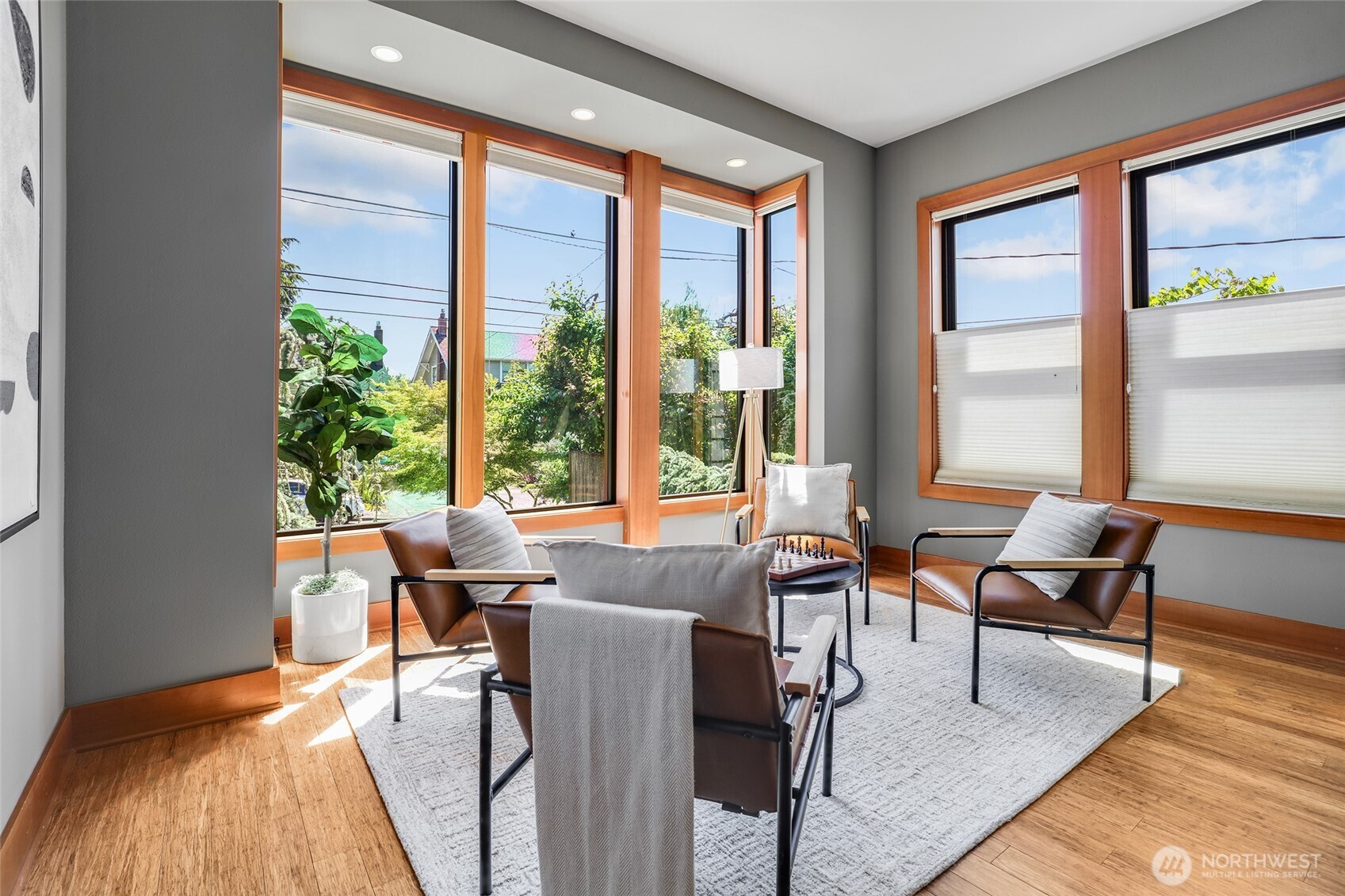 2334 North 57th Street Seattle, WA 98103 - Photo 14 of 27 a living room with furniture and floor to ceiling windows