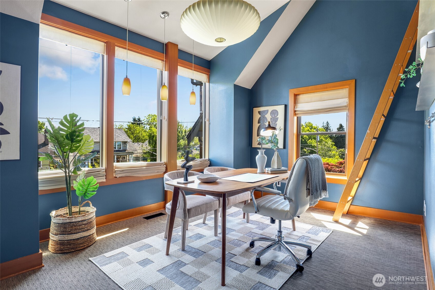 2334 North 57th Street Seattle, WA 98103 - Photo 16 of 27 a view of a livingroom with furniture and a potted plant