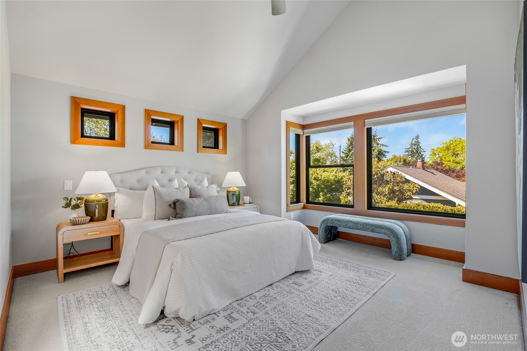 2334 North 57th Street Seattle, WA 98103 - Photo 18 of 27 a bedroom with bed and a large window