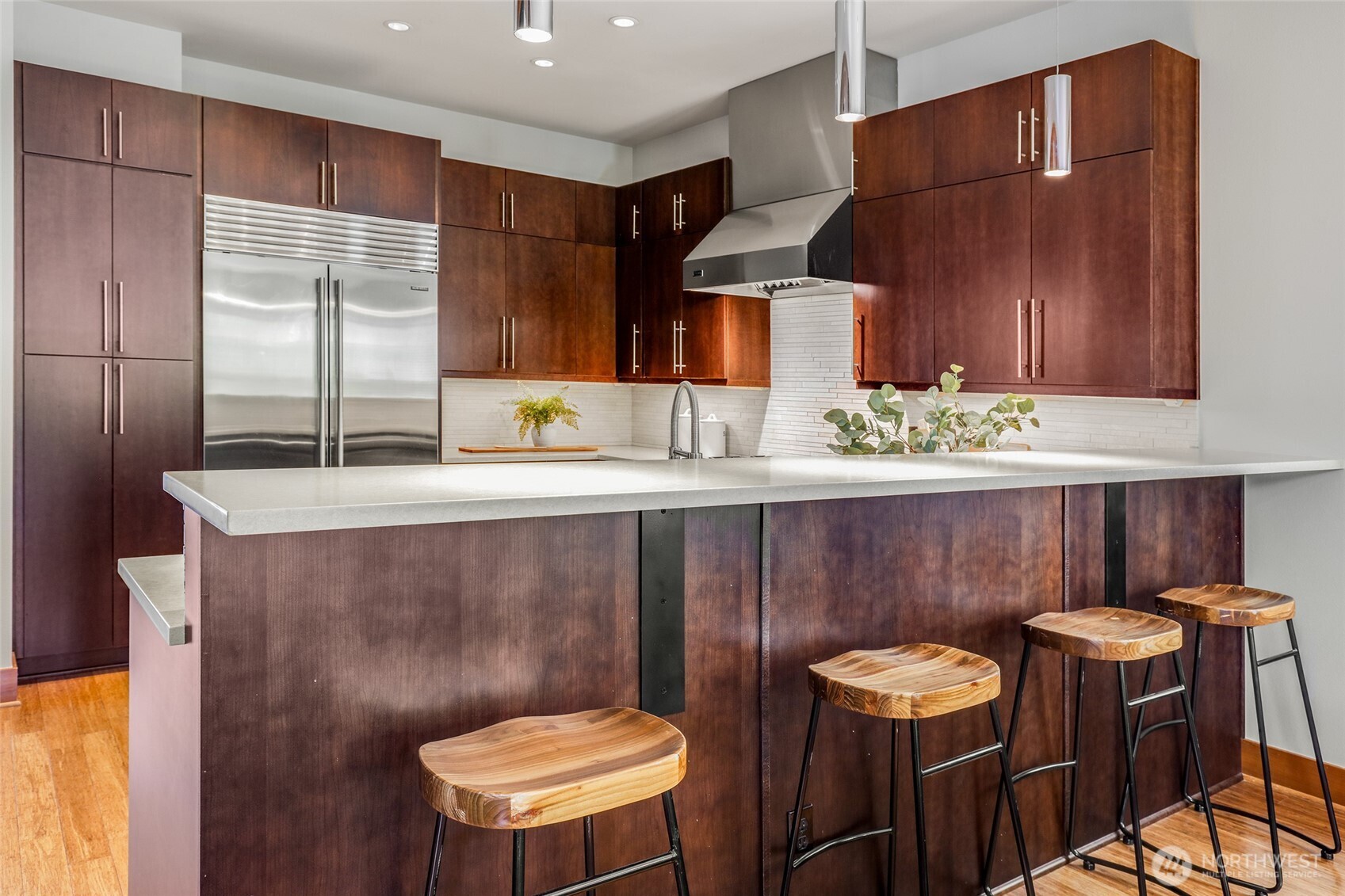2334 North 57th Street Seattle, WA 98103 - Photo 5 of 27 a bathroom with a sink a toilet and mirror