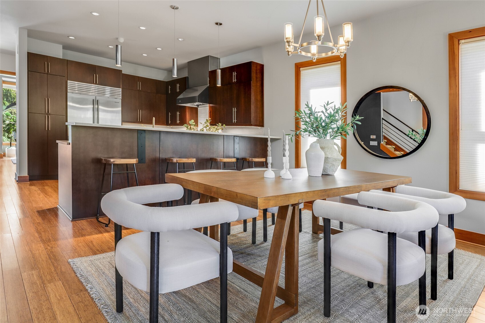 2334 North 57th Street Seattle, WA 98103 - Photo 6 of 27 a view of a dining room with furniture and chandelier