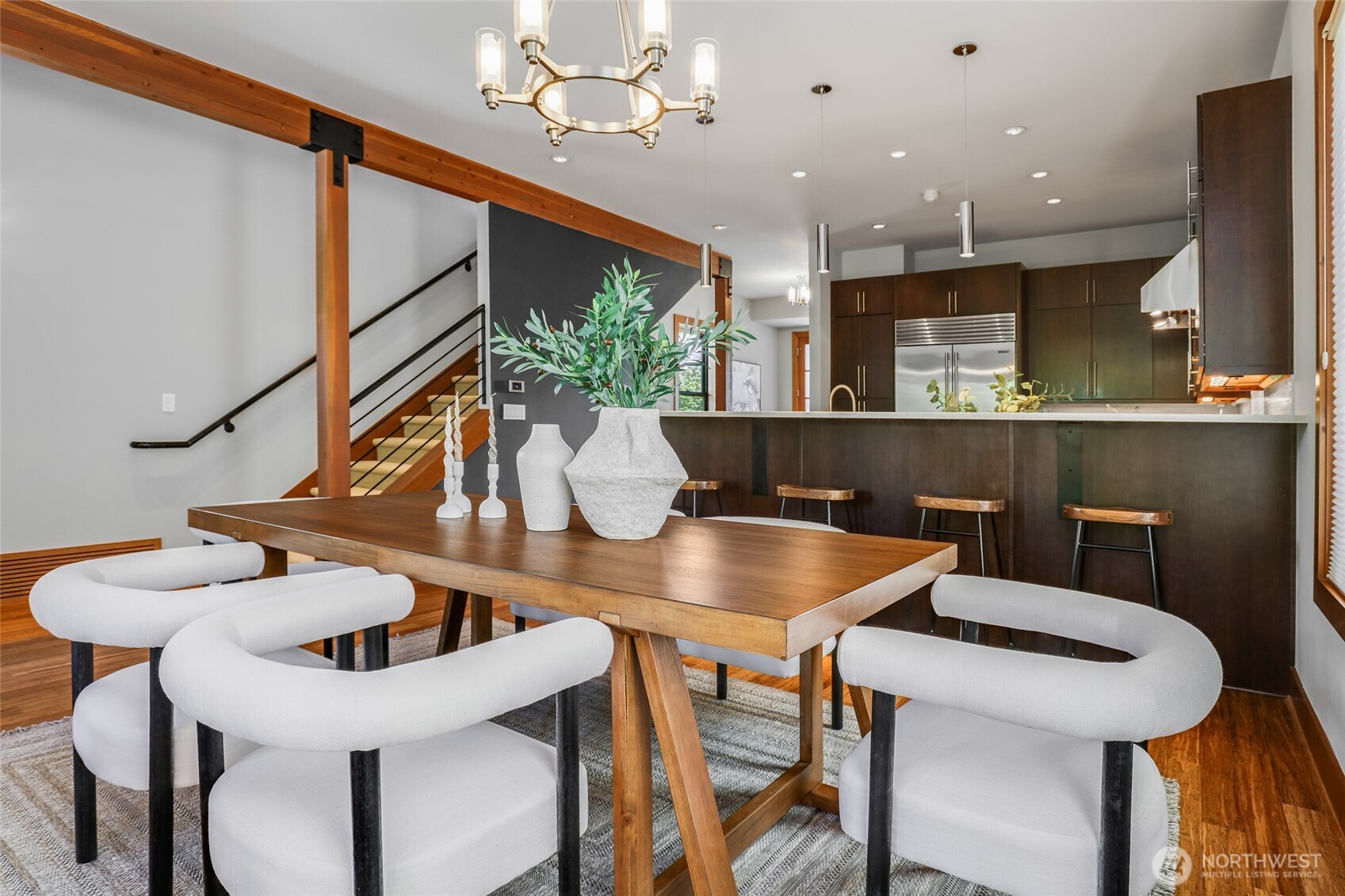 2334 North 57th Street Seattle, WA 98103 - Photo 7 of 27 a view of a dining room with furniture and wooden floor