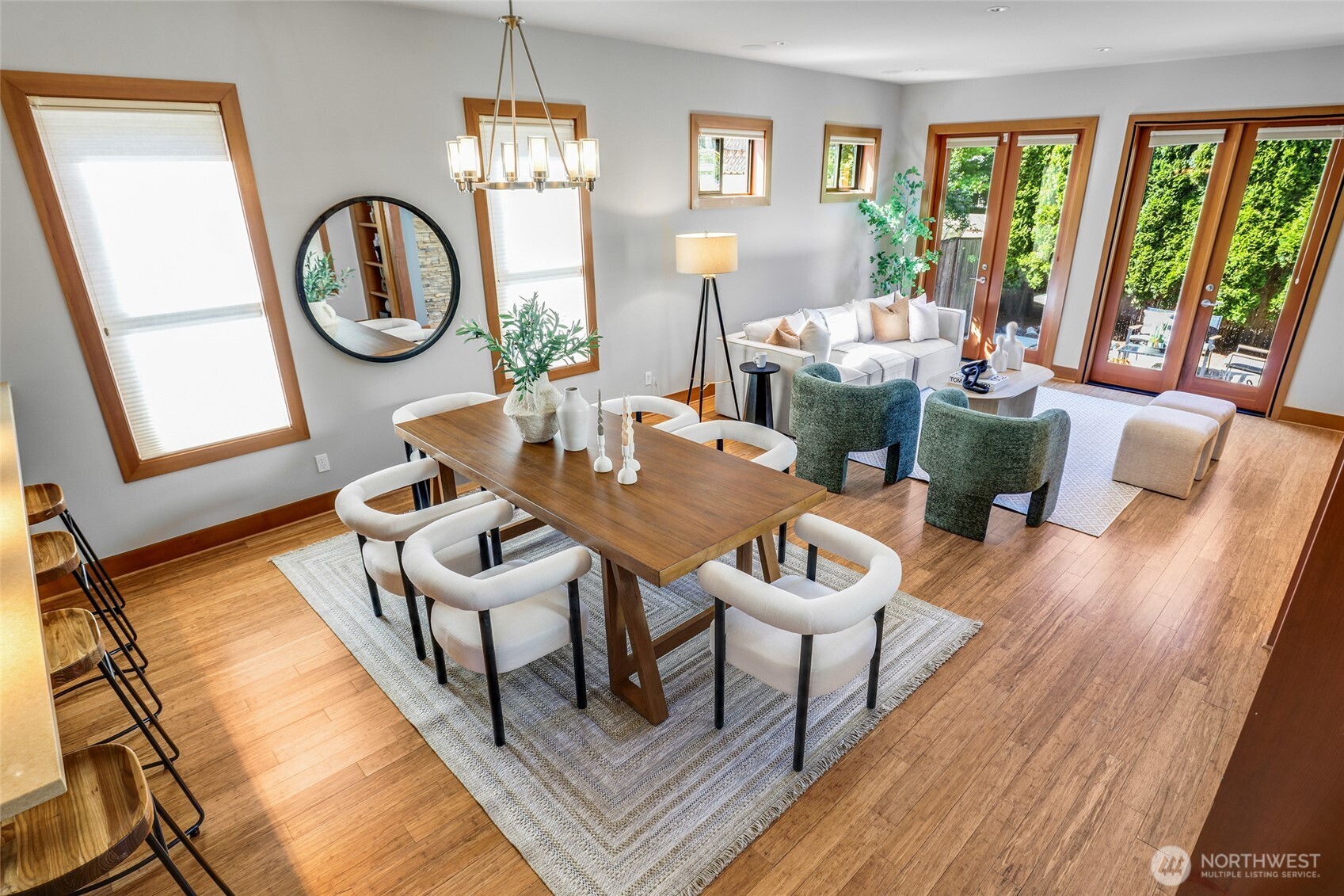 2334 North 57th Street Seattle, WA 98103 - Photo 10 of 27 a living room with furniture a window and wooden floor