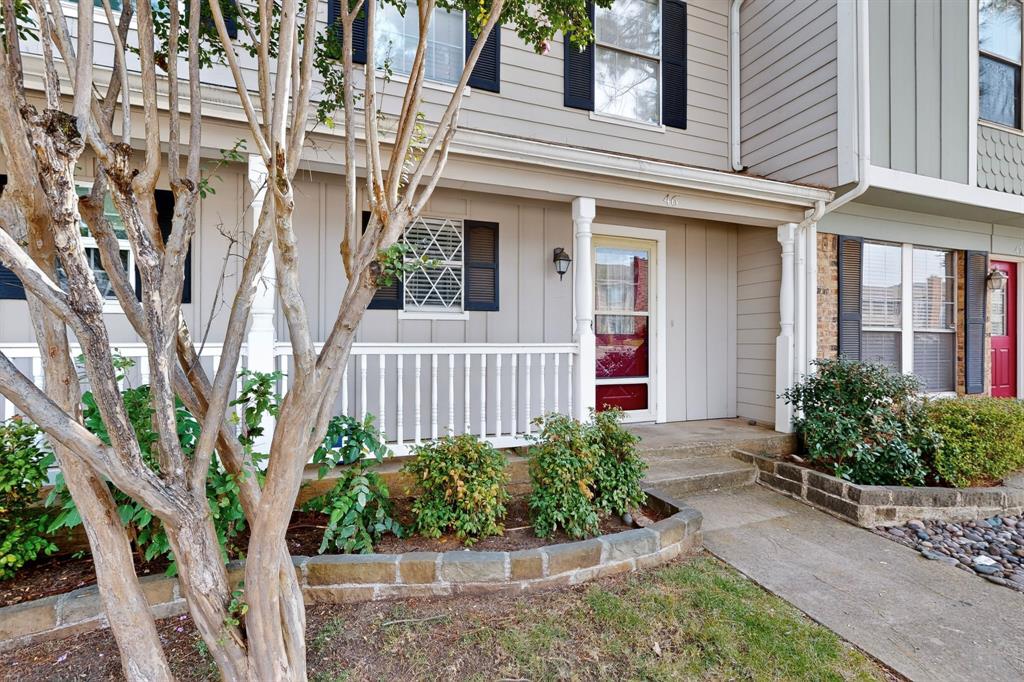 46 Abbey Road Euless, TX 76039 - Photo 1 of 16 View of exterior entry with board and batten siding and covered porch