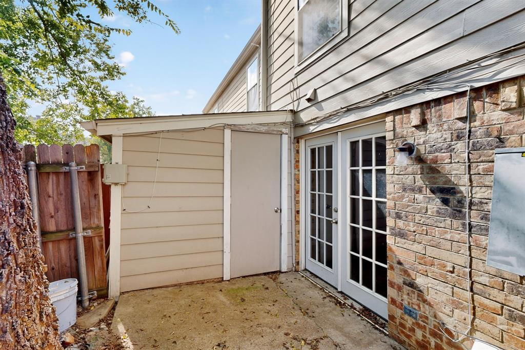 46 Abbey Road Euless, TX 76039 - Photo 12 of 16 Doorway to property with french doors and a patio area