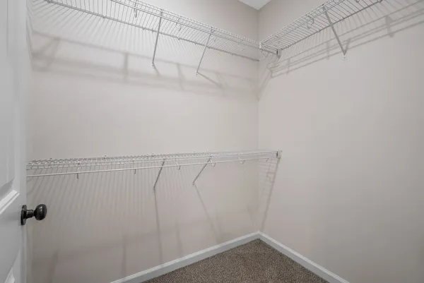 a view of a room with racks on the wall