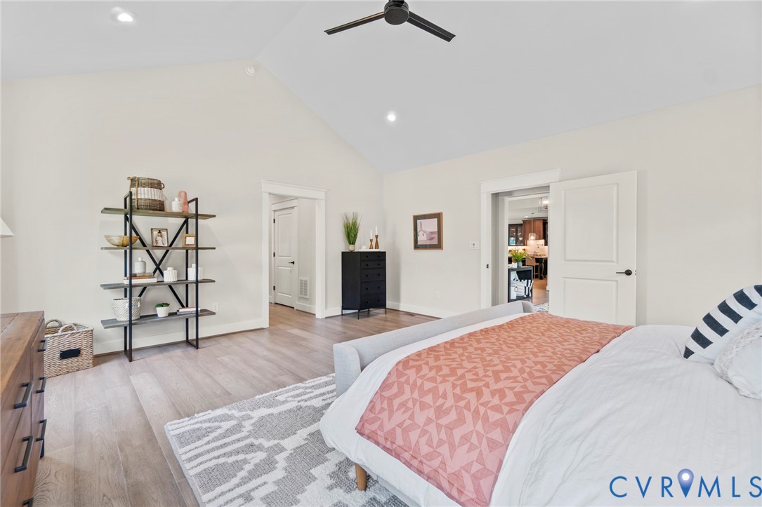 4891 Gooden Trail Quinton, VA 23141 - Photo 13 of 52 Bedroom featuring light wood-type flooring, a high