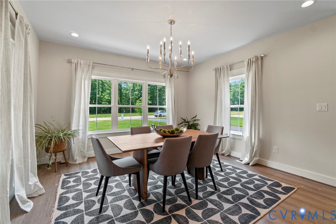 4891 Gooden Trail Quinton, VA 23141 - Photo 28 of 52 Dining area with hanging lights and light wood-sty