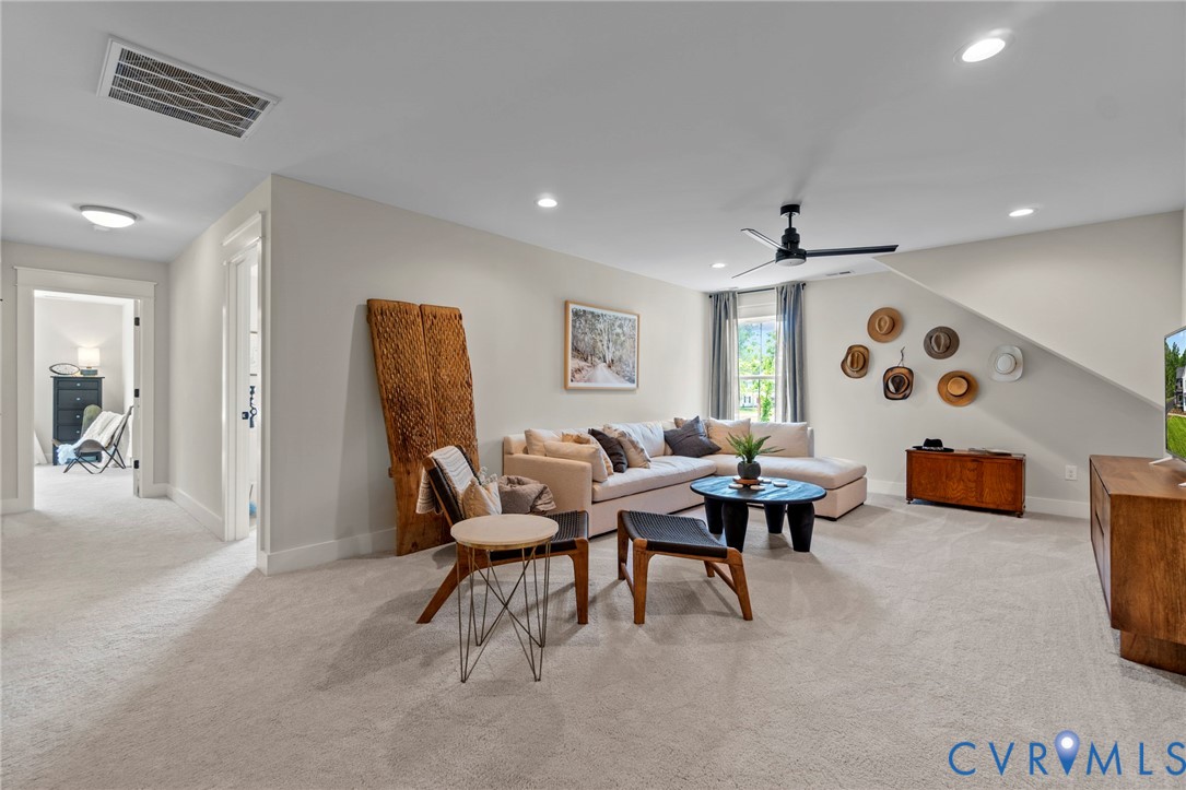 4891 Gooden Trail Quinton, VA 23141 - Photo 31 of 52 Living area featuring light colored carpet, a ceil