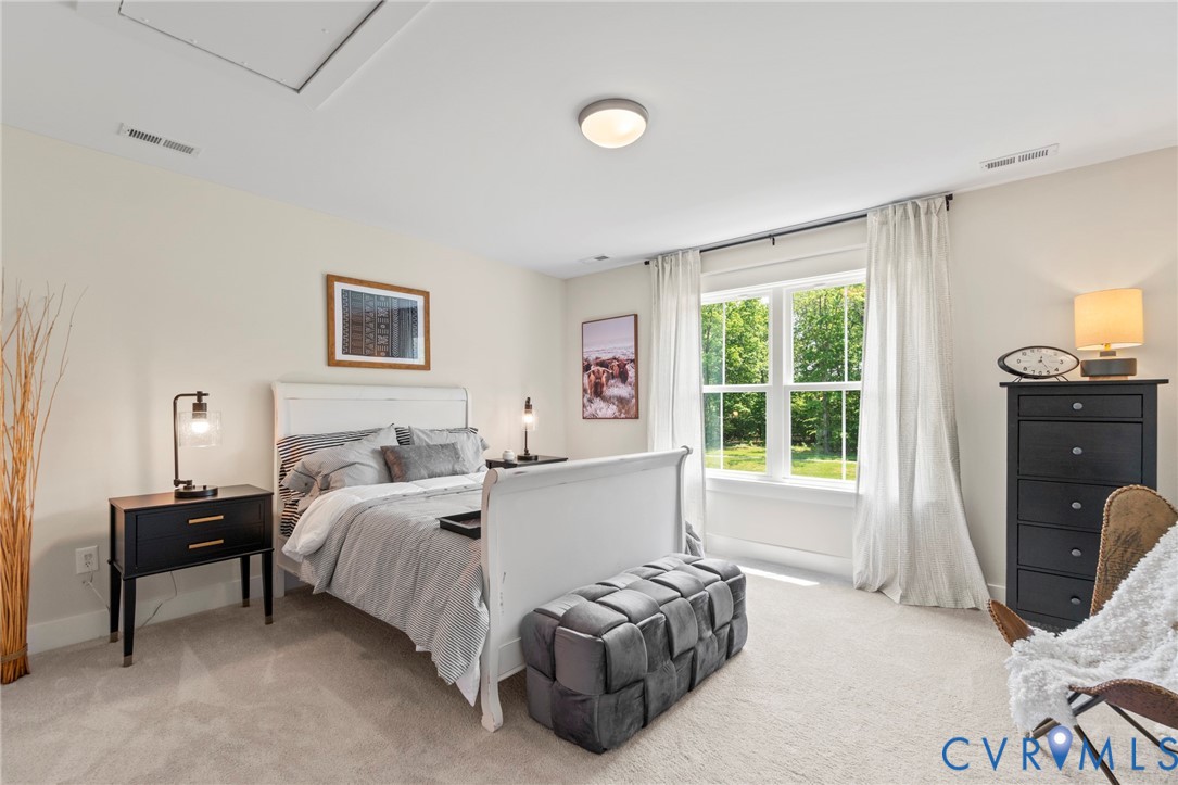 4891 Gooden Trail Quinton, VA 23141 - Photo 41 of 52 Bedroom with light colored carpet and baseboards