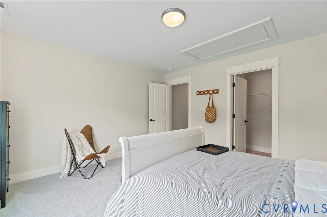 4891 Gooden Trail Quinton, VA 23141 - Photo 42 of 52 Bedroom featuring carpet and a walk in closet