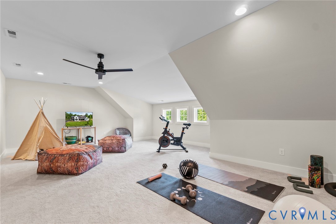 4891 Gooden Trail Quinton, VA 23141 - Photo 43 of 52 Workout area with lofted ceiling, carpet floors, a
