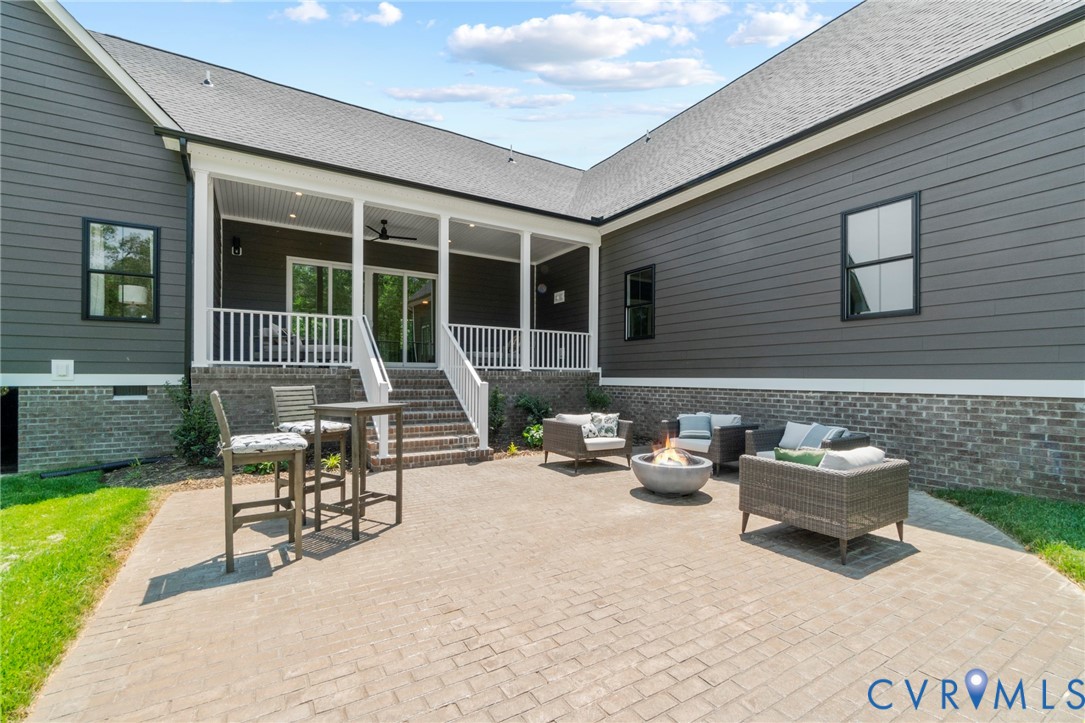 4891 Gooden Trail Quinton, VA 23141 - Photo 50 of 52 View of patio featuring an outdoor living space wi