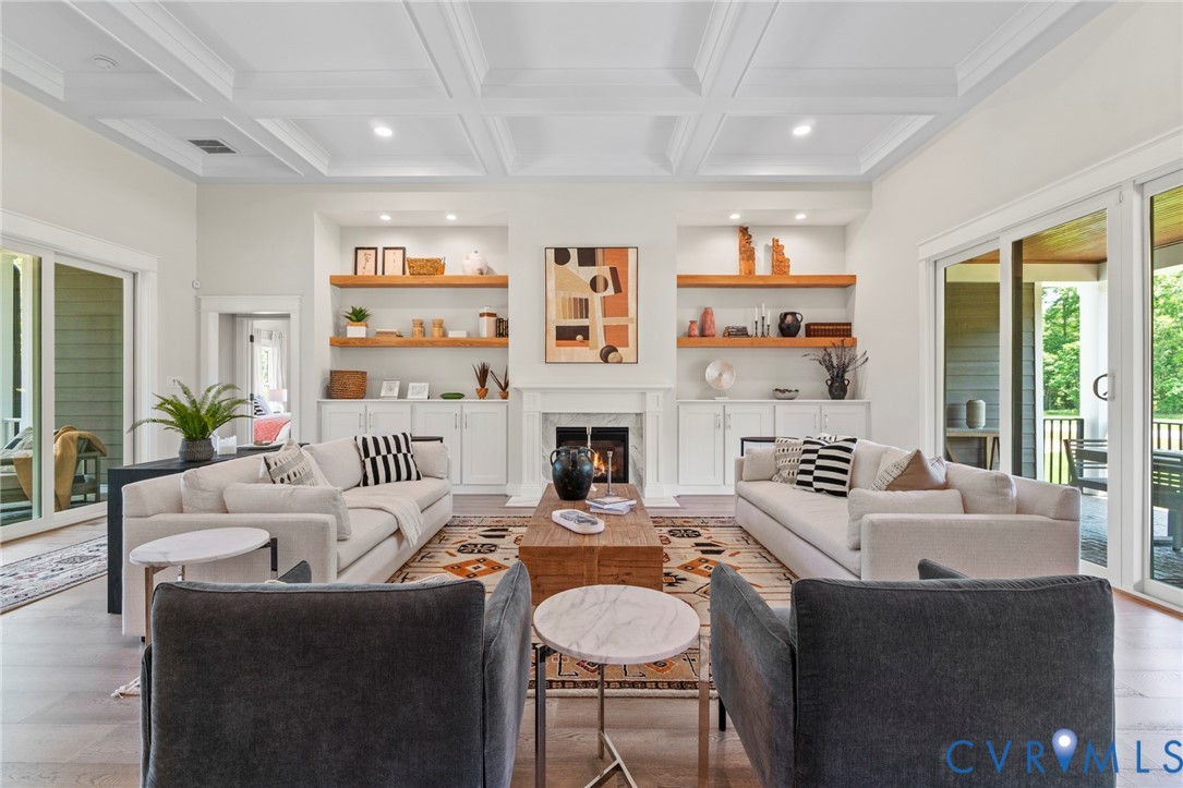 4891 Gooden Trail Quinton, VA 23141 - Photo 6 of 52 Living room featuring wood finished floors, a fire