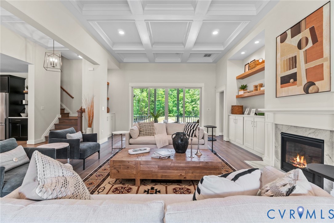 4891 Gooden Trail Quinton, VA 23141 - Photo 10 of 52 Living area with wood finished floors, a fireplace