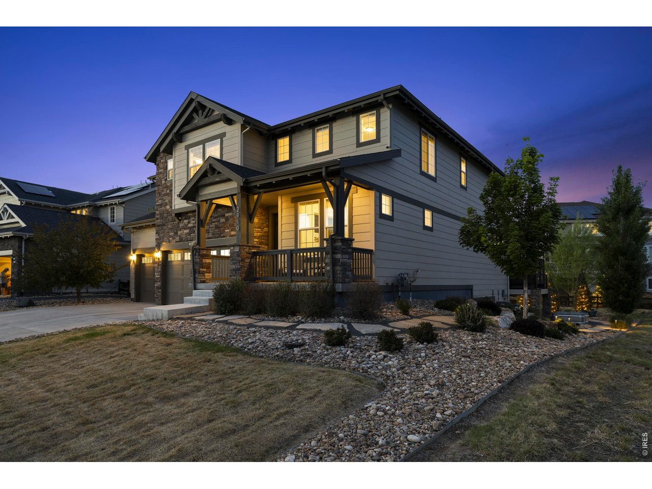 2910 Water View Street Timnath, CO 80547 - Photo 41 of 50 a front view of a house with a yard