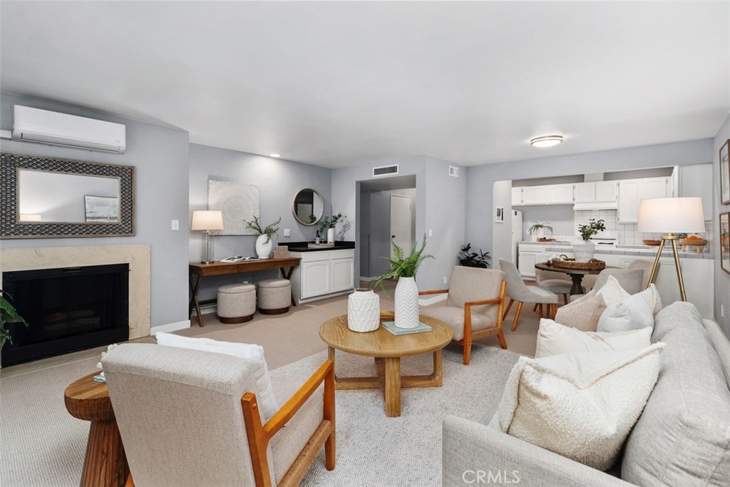 12300 Montecito Road, Unit 39 Seal Beach, CA 90740 - Photo 9 of 41 Living Area, featuring fireplace